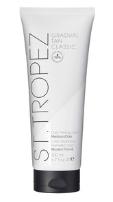 St.Tropez Gradual Tan Firming Lotion, Sun Kissed Glow Self Tan Moisturizer, 5 Skincare Benefits, Vegan, Natural & Cruelty Free, 6.7 Fl Oz